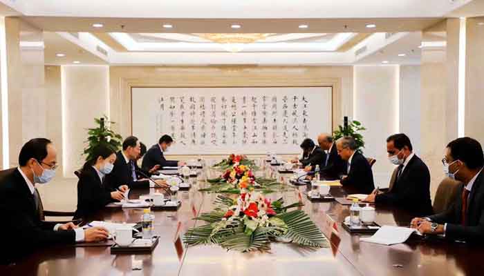 The picture shows a meeting betweenPakistani and Chinese delegations. — Radio Pakistan