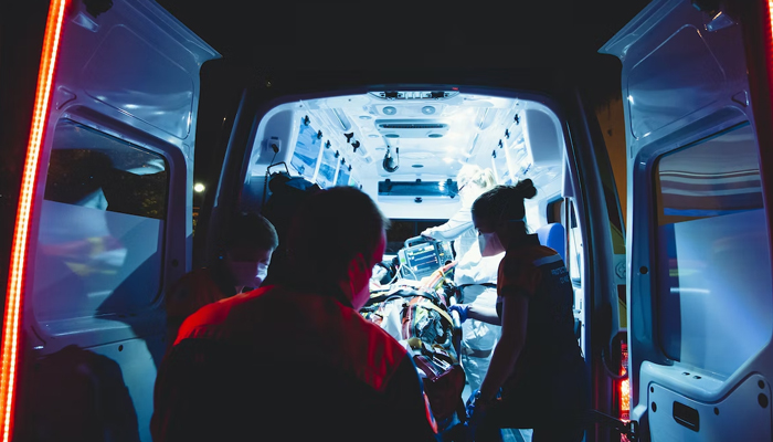 In this representational image, healthcare workers can be seen taking a patient in the ambulance. — Unsplash/File