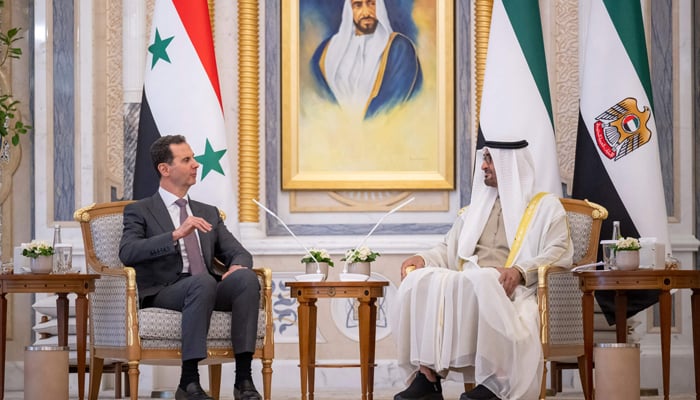 This image shows Emirati President Sheikh Mohamed bin Zayed al-Nahyan (R) meeting his Syrian counterpart Bashar al-Assad in Abu Dhabi on March 19, 2023. — AFP