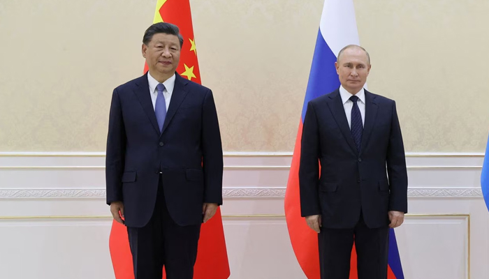 Chinese President Xi Jinping, Russian President Vladimir Putin pose for a picture during a meeting of the Shanghai Cooperation Organisation (SCO). — Reuters/File