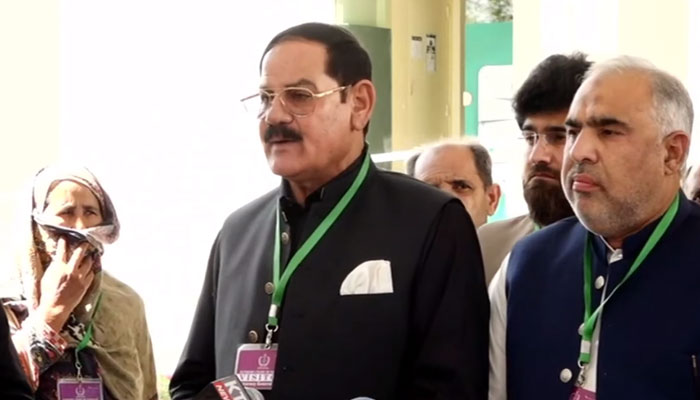 Khyber Pakhtunkhwa Assembly Speaker Mushtaq Ghani and Pakistan Tehreek-e-Insaf leader Asad Qaiser addressing the media after filing a petition in the Supreme Court. — Screengrab/YouTube/PTI