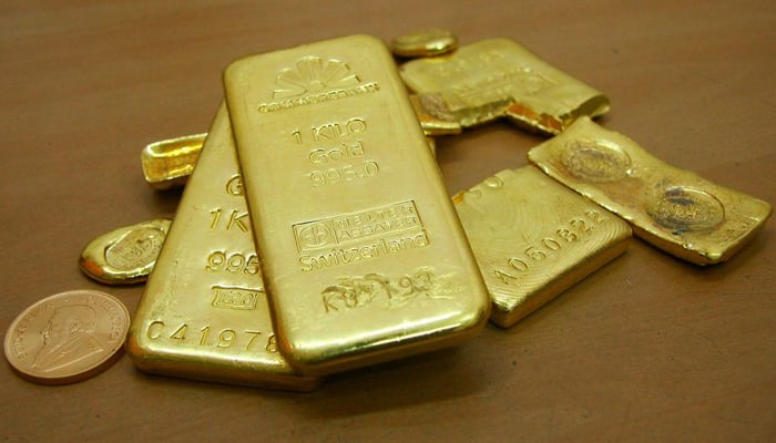 Gold bars are displayed at a gold jewellery shop. — Reuters/File
