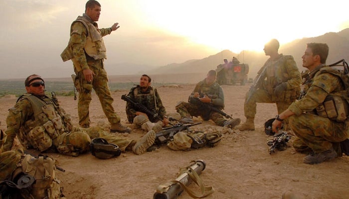 Australian Major Andrew Dah speaking to his troops at Shah Zafar, Afghanistan on May 7th, 2008. — AFP