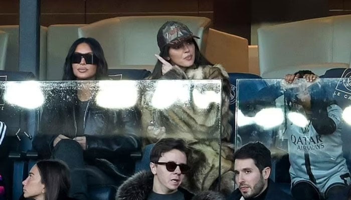 Kim Kardashian and Kendell Jenner unexpectedly spotted at a football match in Paris