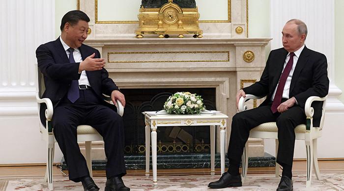 'Dear friends' Xi and Putin meet in Moscow as Ukraine war rages