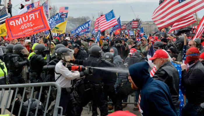 Trump supporters clash with police and security forces as they try to storm the US Capitol in Washington, DC on January 6.—AFP/File