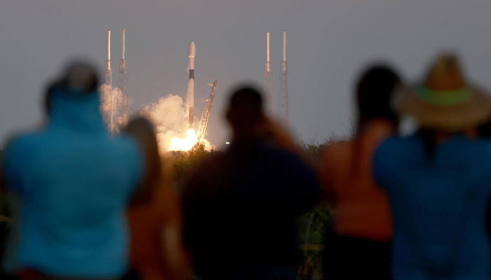 People watch as a SpaceX Falcon 9 rocket lifts off at Cape Canaveral Space Force Station on February 27, 2023. AFP/File