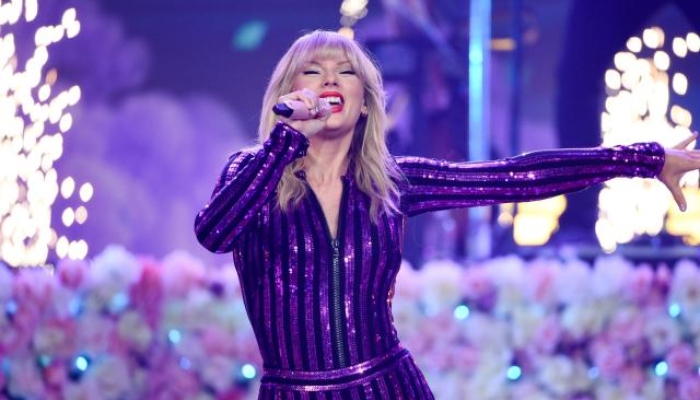 Taylor Swift wows fans as she dives head first into stage during Eras Tour