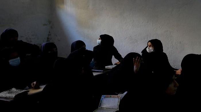 Afghanistan's school year starts with calls for all girls to be allowed back