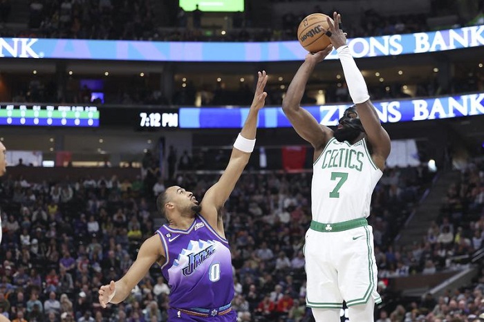 Boston Celtics guard Jaylen Brown (7) shoots a three-point shot over Utah Jazz guard Talen Horton-Tucker (0) in the first quarter at Vivint Arena in Salt Lake city Utah, USA. — Reuters
