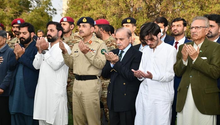 (L-R) Chief of Army Staff (COAS) General Syed Asim Munir, Prime Minister Shehbaz Sharif and President Dr Arif Alvi attend the funeral of Brigadier Mustafa Kamal Barki held at Race Course, Rawalpindi on March 22, 2023. — ISPR