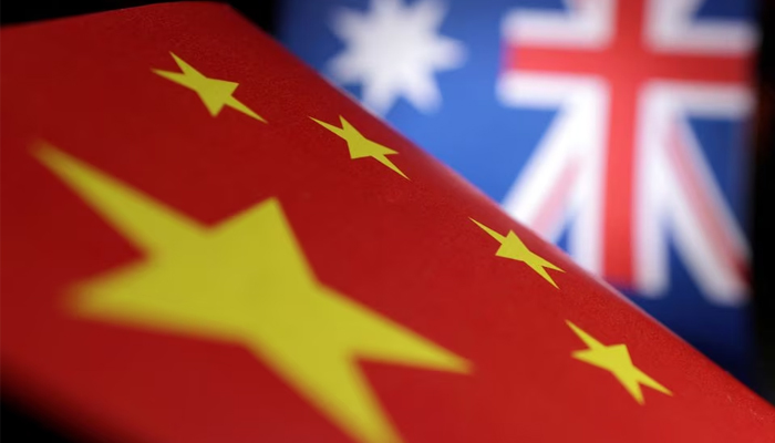 Printed Chinese and Australian flags are seen in this illustration. — Reuters/File