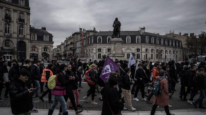 French unions dig in after Macron defends pension reform
