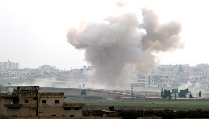 Smoke rises after an air strike in Saraqeb in Idlib province, Syria February 28, 2020. Reuters/File