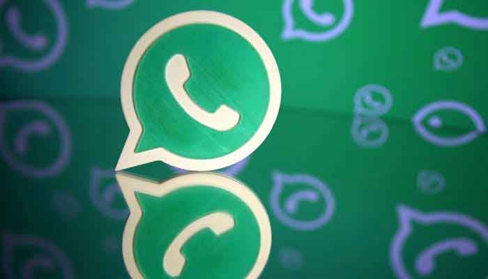A 3D printed WhatsApp logo is seen in front of a displayed WhatsApp logo in this illustration September 14, 2017. — Reuters
