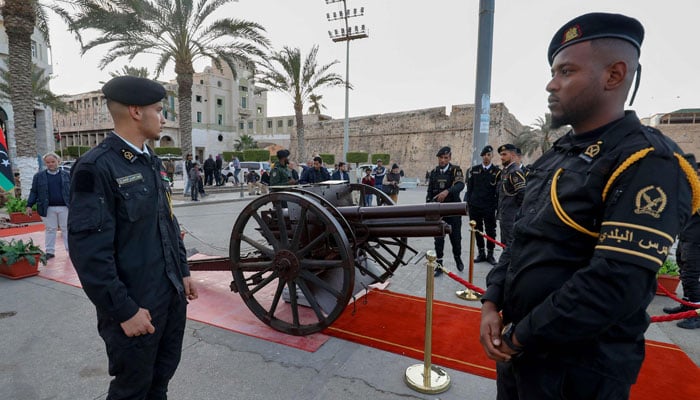 In this picture taken on March 23, 2023, Tripoli municipality officials prepare to fire the Iftar cannon marking the time to break the daytime fast at Martyrs Square in the Libyan capital, on the first day of the holy month of Ramadan. — AFP