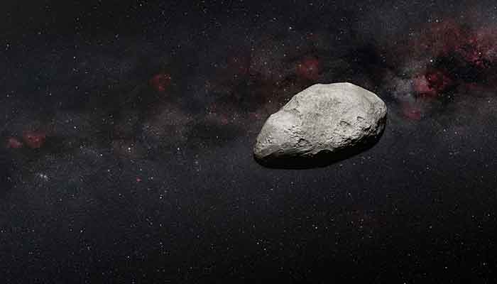 A handout artists impression released on March 24, 2023 by the European Space Agency (ESA) shows a grey, irregularly-shaped asteroid, rocky objects that often pass safely past Earth. — AFP