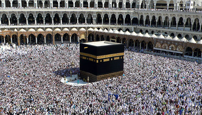 Muslim pilgrims walk around the Kaaba at the Grand Mosque in the Saudi holy city of Mecca on November 30, 2009.
