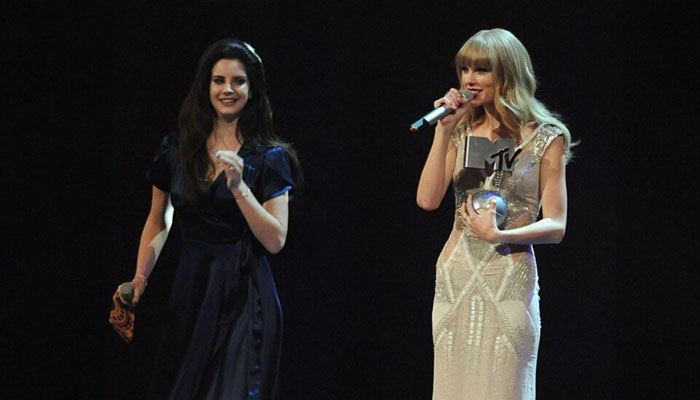 Taylor Swift takes her hat off to Lana Del Rey during Las Vegas concert