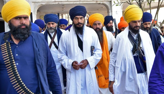 Amritpal Singh, a radical Sikh leader, leaves the holy Sikh shrine of the Golden Temple along with his supporters, in Amritsar, India, March 3, 2023. — Reuters