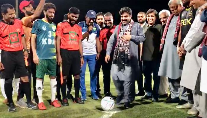 Sindh Local Government Minister Syed Nasir Hussain Shah inaugurates the event by performing an honorary kick-off on March 25. — Photo by author