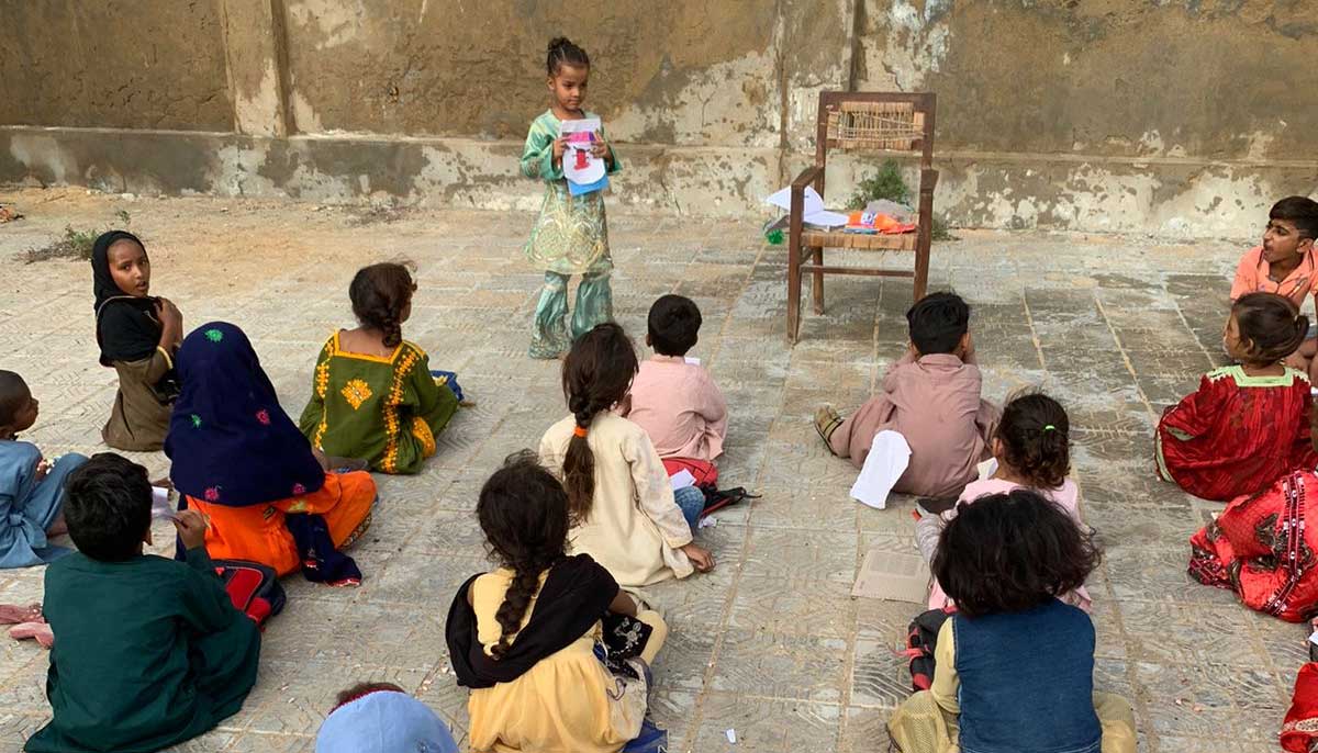 A student reads a lesson during class at The Education House. — Photo by Sufiyan Ahmad