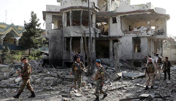 Afghan National Army (ANA) soldiers keep watch a the site of a car bomb blast in Kabul, Afghanistan on August 4, 2021. — Reuters