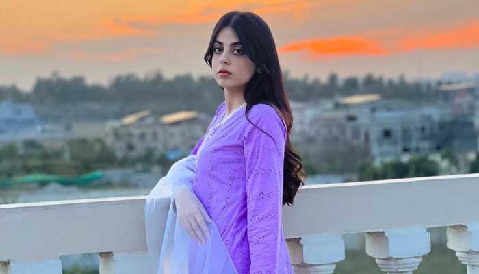 Pakistani actor Yashma Gill poses with a scenic view in the backdrop. — Instagram/@yashmagillofficial
