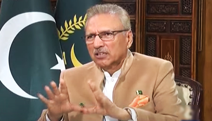 President Arif Alvi speaks during an interview with Geo News Hamid Mir in Islamabad, on March 29, 2023, in this still taken from a video. — YouTube/GeoNews