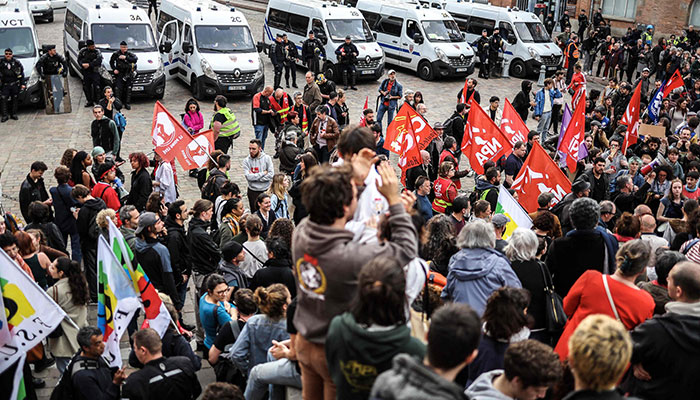 Protesters gather in front of the Haute-Garonne prefecture during a demonstration against police violence in Toulouse, southwestern France, on March 30, 2023.—AFP