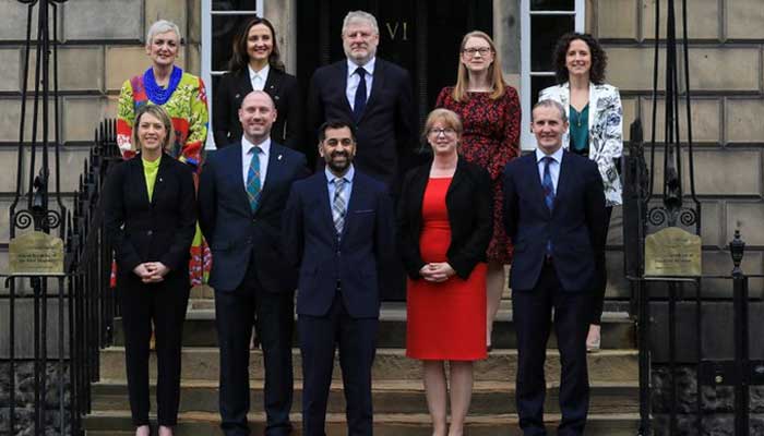 Scotlands First Minister Humza Yousaf (bottom centre) is pictured with his Cabinet members and ministers. — Twitter/@HumzaYousaf
