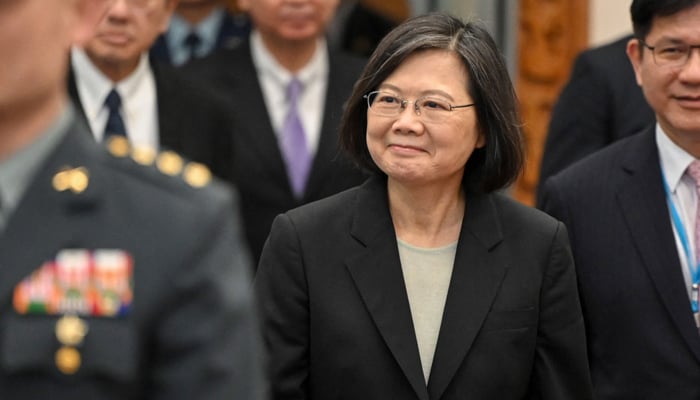 Taiwanese President Tsai Ing wen arrives at the boarding gate of the international airport in Taoyuan on March 29, 2023. — AFP