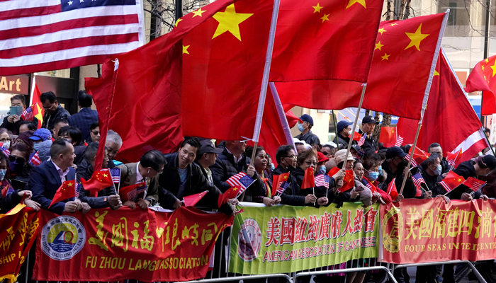 Protesters look on as Taiwanese President Tsai Ing-wen, not pictured, arrives at her hotel in New York City on March 29, 2023, as she begins a ten-day international trip. — AFP