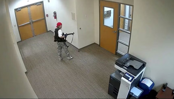 A still image from surveillance video shows what the Metropolitan Nashville Police Department describe as mass shooting suspect Audrey Elizabeth Hale, 28, entering The Covenant School carrying weapons in Nashville, Tennessee, U.S. March 27, 2023. — Reuters