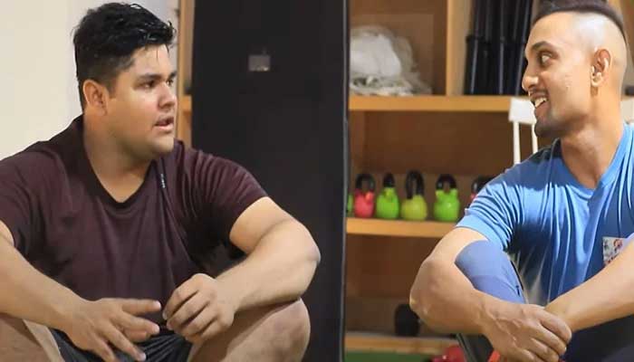 Pakistan cricket teams hard-hitting batter Azam Khan (left) talks to his trainer Shehzar Mohammad. — Screengrab/ YouTube/ Khel Shel