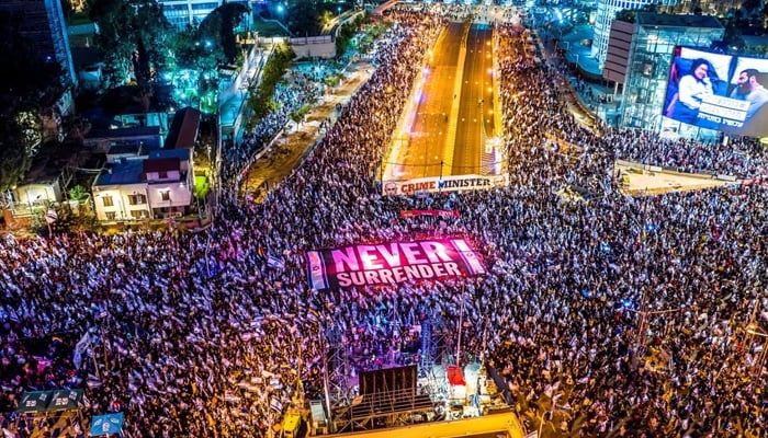An aerial view shows people protesting as Israeli Prime Minister Benjamin Netanyahus nationalist coalition government presses on with its contentious judicial overhaul, in Tel Aviv, Israel, March 18, 2023. — Reuters