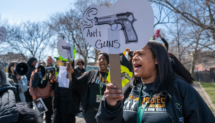 Students, teachers and others participate in a rally against gun violence outside of the Williamsburg Charter High School in Brooklyn on March 29, 2023, in New York City. — AFP