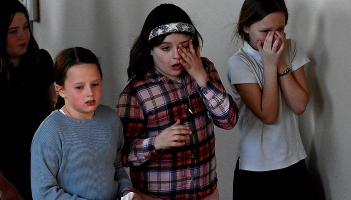 A group of girls leave after a prayer vigil at Woodmont Christian Church for victims of the mass shooting at Covenant School in Nashville, Tennessee, on March 27, 2023. — Reuters