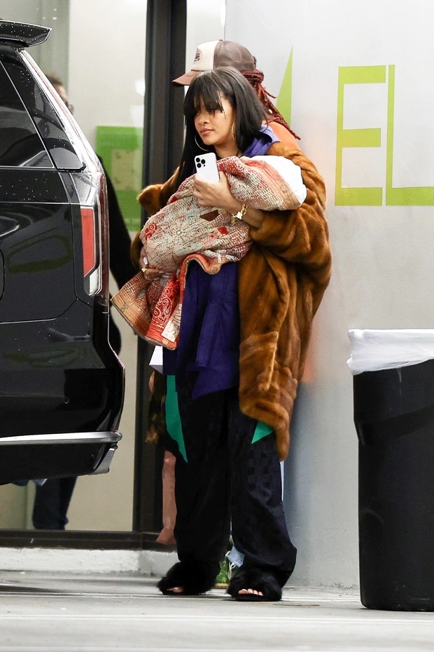 Pregnant Rihanna surprises onlookers as she steps out with her son in L. A