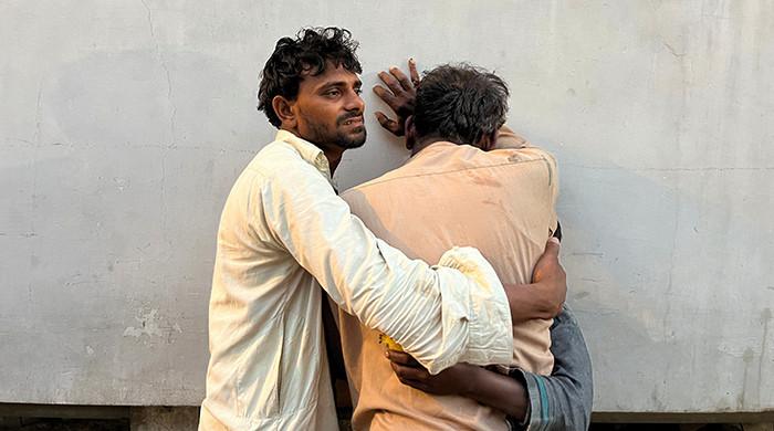 9 women among 12 killed during ration distribution in Karachi