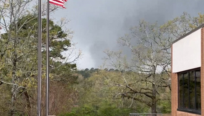 This still from a video provided by Lane Hancock on March 31, 2023, shows a tornado brewing in Little Rock, Arkansas.  — AFP
