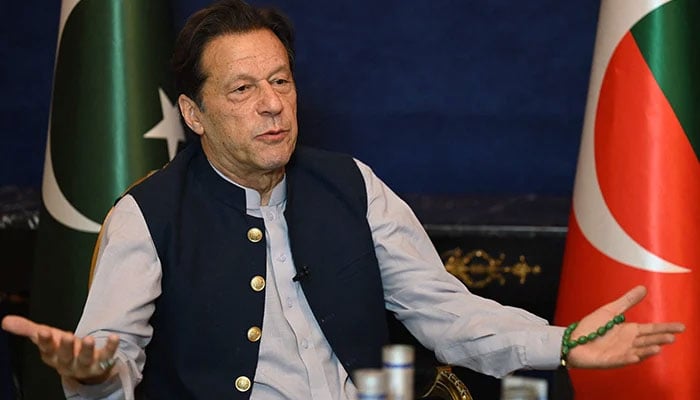 Pakistan Tehreek-e-Insaf (PTI) Chairman Imran Khan speaks during an interview with AFP at his residence in Lahore on March 15, 2023. — AFP