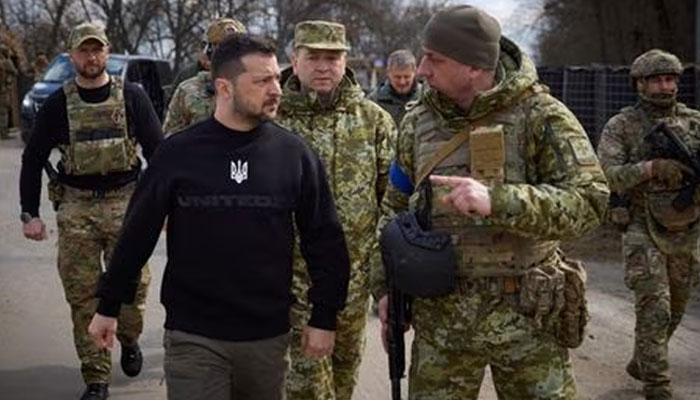 Ukraines President Volodymyr Zelenskiy visits positions of Ukrainian Border Guards near the border with Russia, amid Russias attack on Ukraine, in Sumy region, Ukraine March 28, 2023.—Reuters