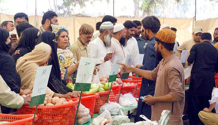 People are busy in buying vegetables and fruits from Sasta Ramadan Bazaar as Chief Minister CM Punjab has announced subsidies on the Ramadan Bazaar located all over the Punjab Provinces. — APP/File