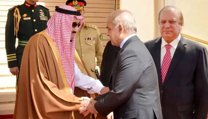 Saudi Arabias King Salman bin Abdulaziz Al Saud greets Prime Minister Shehbaz Sharif while Nawaz Sharif looks on in this undated photo. — Geo News/File
