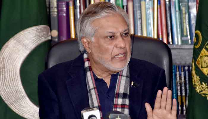 Finance Minister Ishaq Dar addressing a press conference in Islamabad. — Online/File