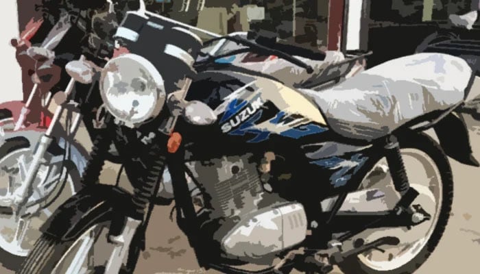 Suzuki GS 150 bike parked outside a showroom in Karachi. — Geo.tv illustration