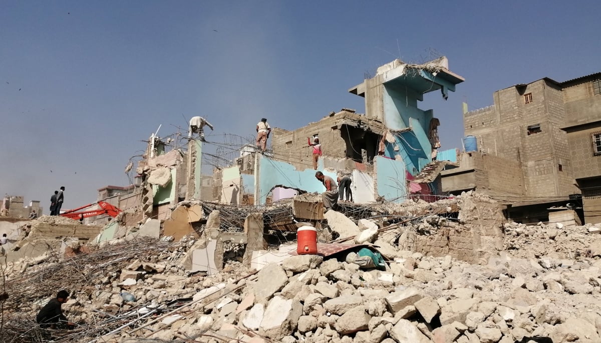 An informal settlement in Karachi being demolished. — Photo by author