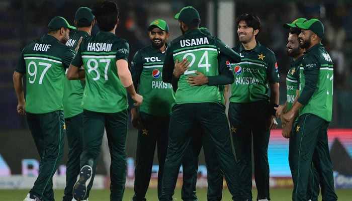Pakistans players celebrate after the dismissal of New Zealands Finn Allen (not pictured) during the third and final ODI cricket match between Pakistan and New Zealand at the National Stadium in Karachi on January 13, 2023. — AFP