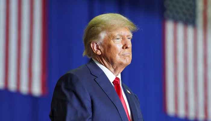 Former US president Donald Trump looks on during a rally in Warren, Michigan, US, on October 1, 2022. — Reuters